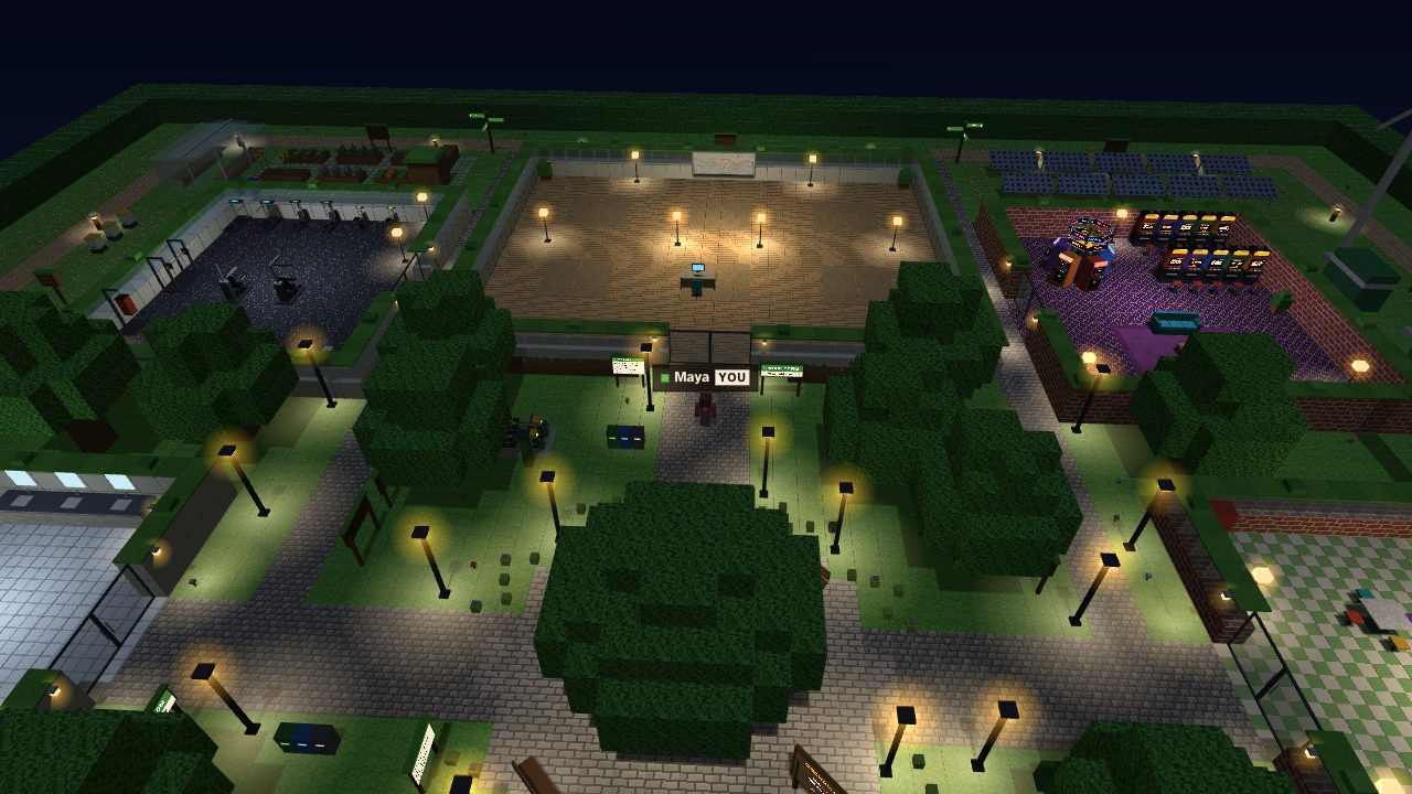 The campus at night with lamps glowing along the paths